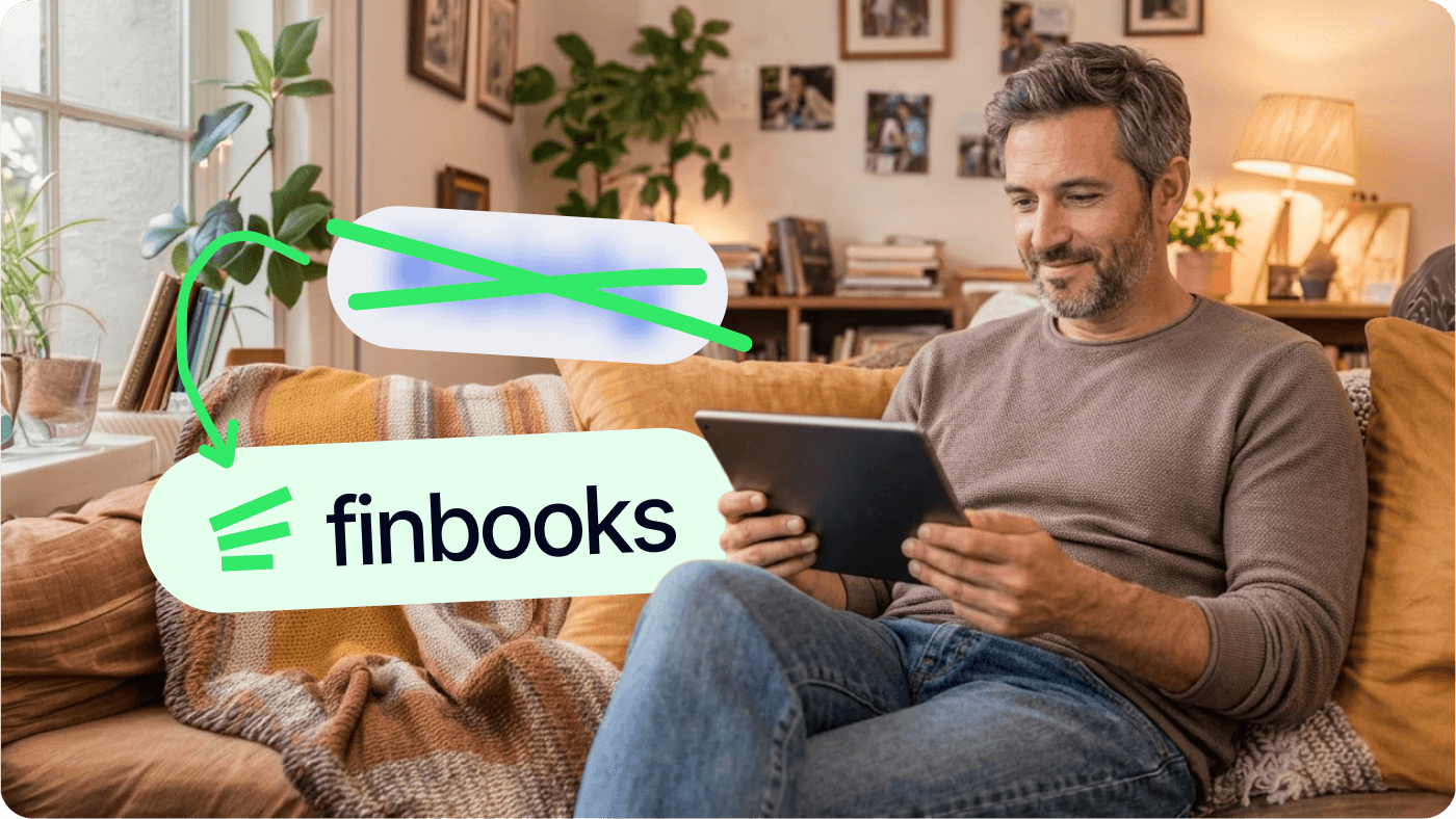 Man using Finbooks on a tablet at home – desktop hero image